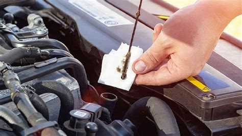 can i check oil while car is running, and should you ever perform car maintenance while driving?